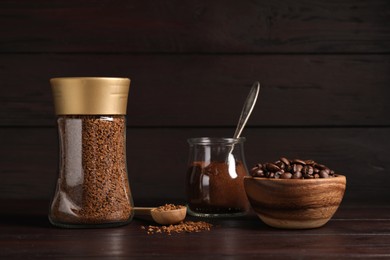 Different types of coffee on wooden table