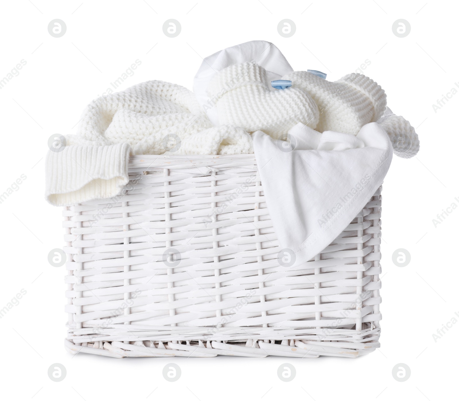 Photo of Laundry basket with dirty clothes on white background