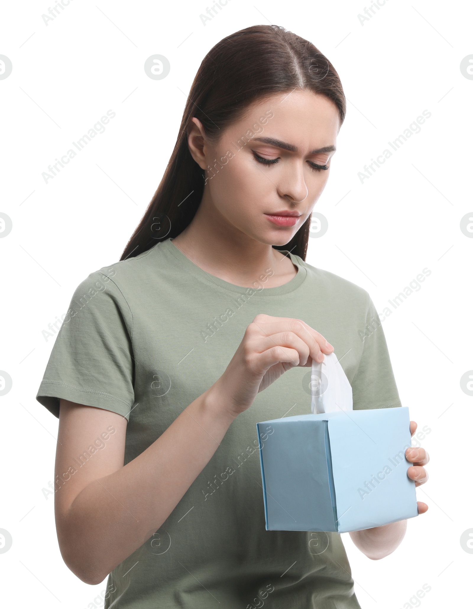 Photo of Sick woman taking tissue on white background. Cold symptoms