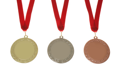 Photo of Gold, silver and bronze medals isolated on white. Space for design