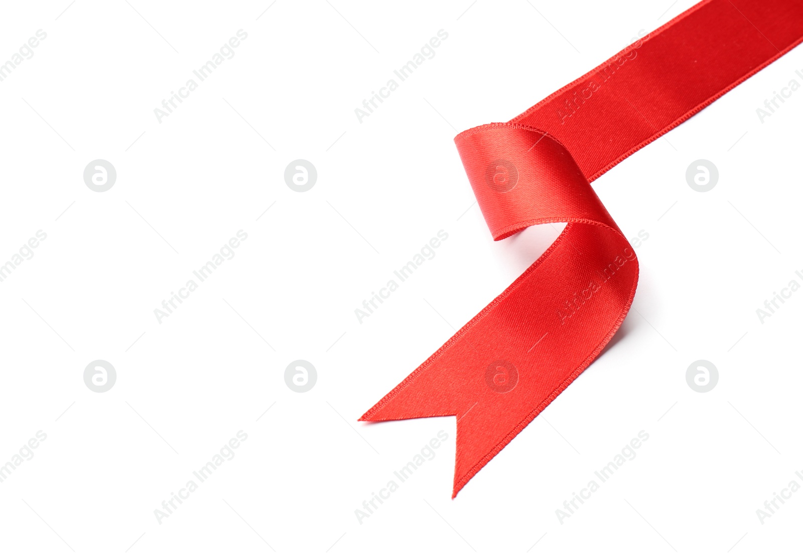 Photo of Simple red ribbon on white background, top view. Festive decoration