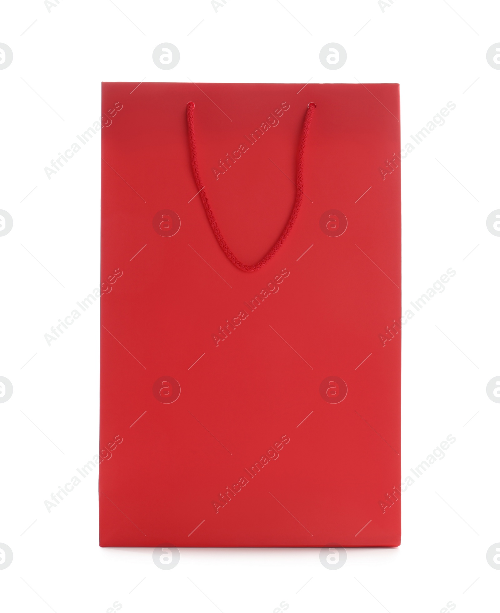 Photo of Red paper shopping bag isolated on white