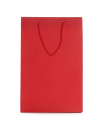 Photo of Red paper shopping bag isolated on white