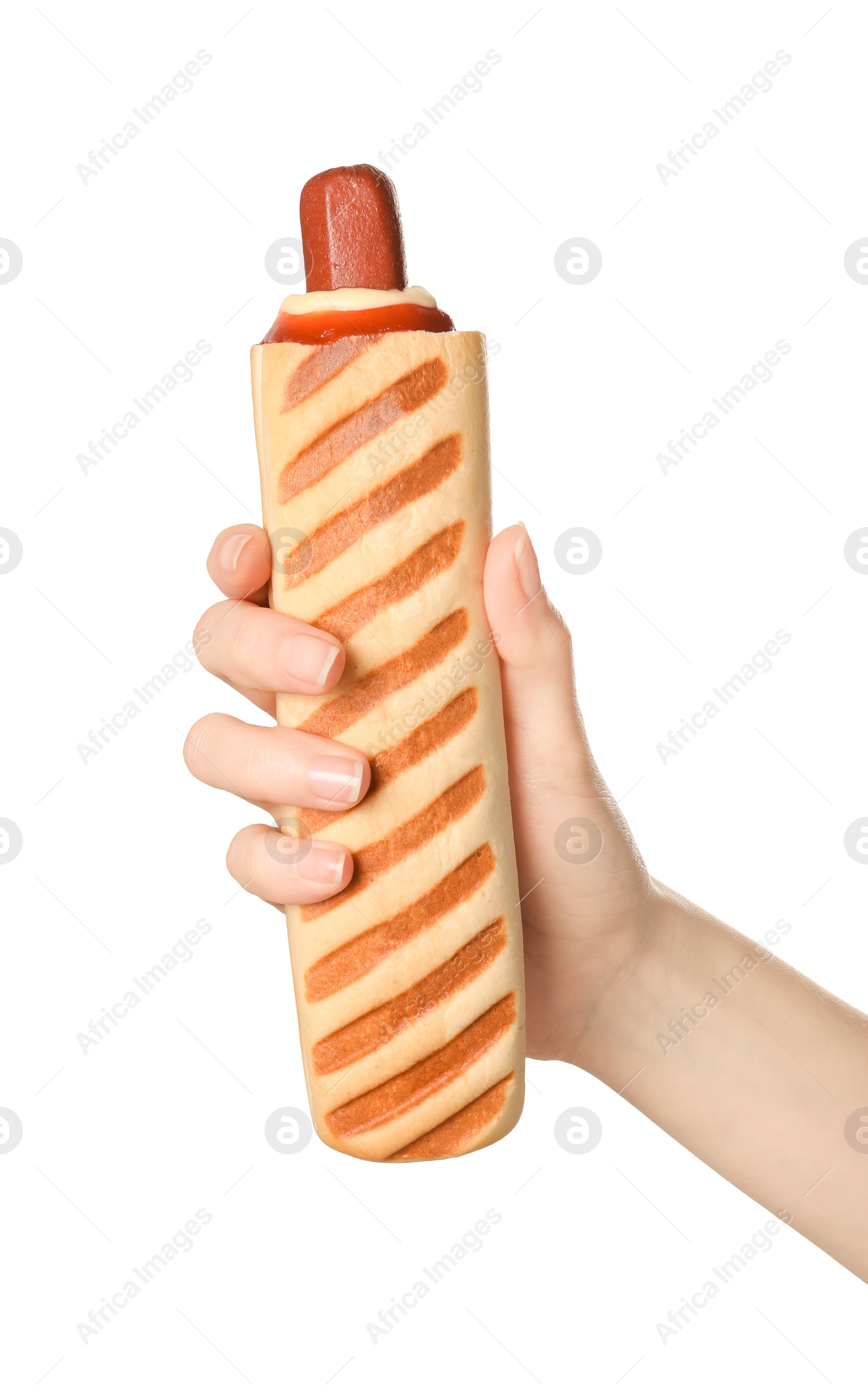 Photo of Woman holding delicious french hot dog on white background, closeup