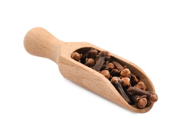 Photo of Wooden scoop with aromatic dry cloves isolated on white