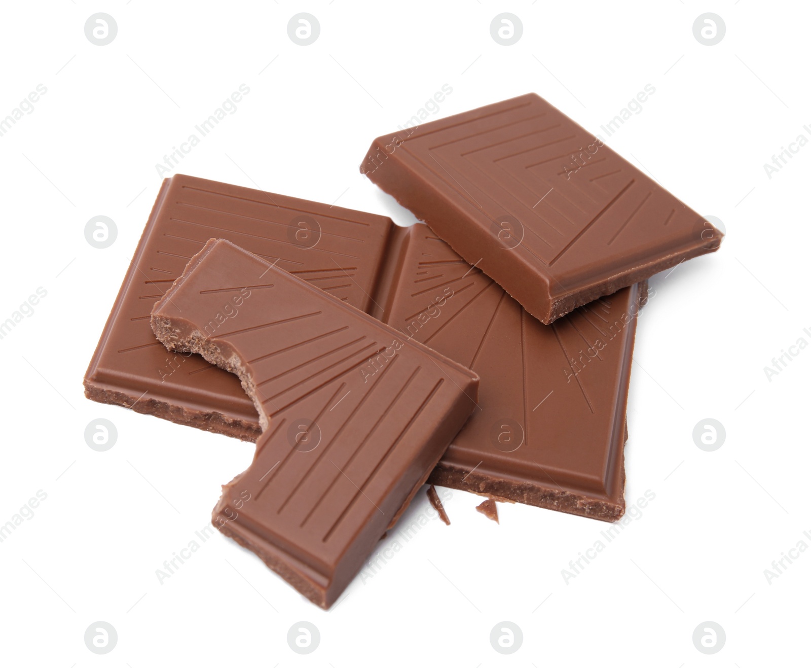 Photo of Broken milk chocolate bar on white background