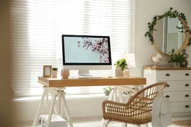 Stylish home office interior with comfortable workplace