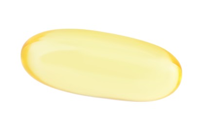 Photo of One yellow vitamin capsule isolated on white, top view