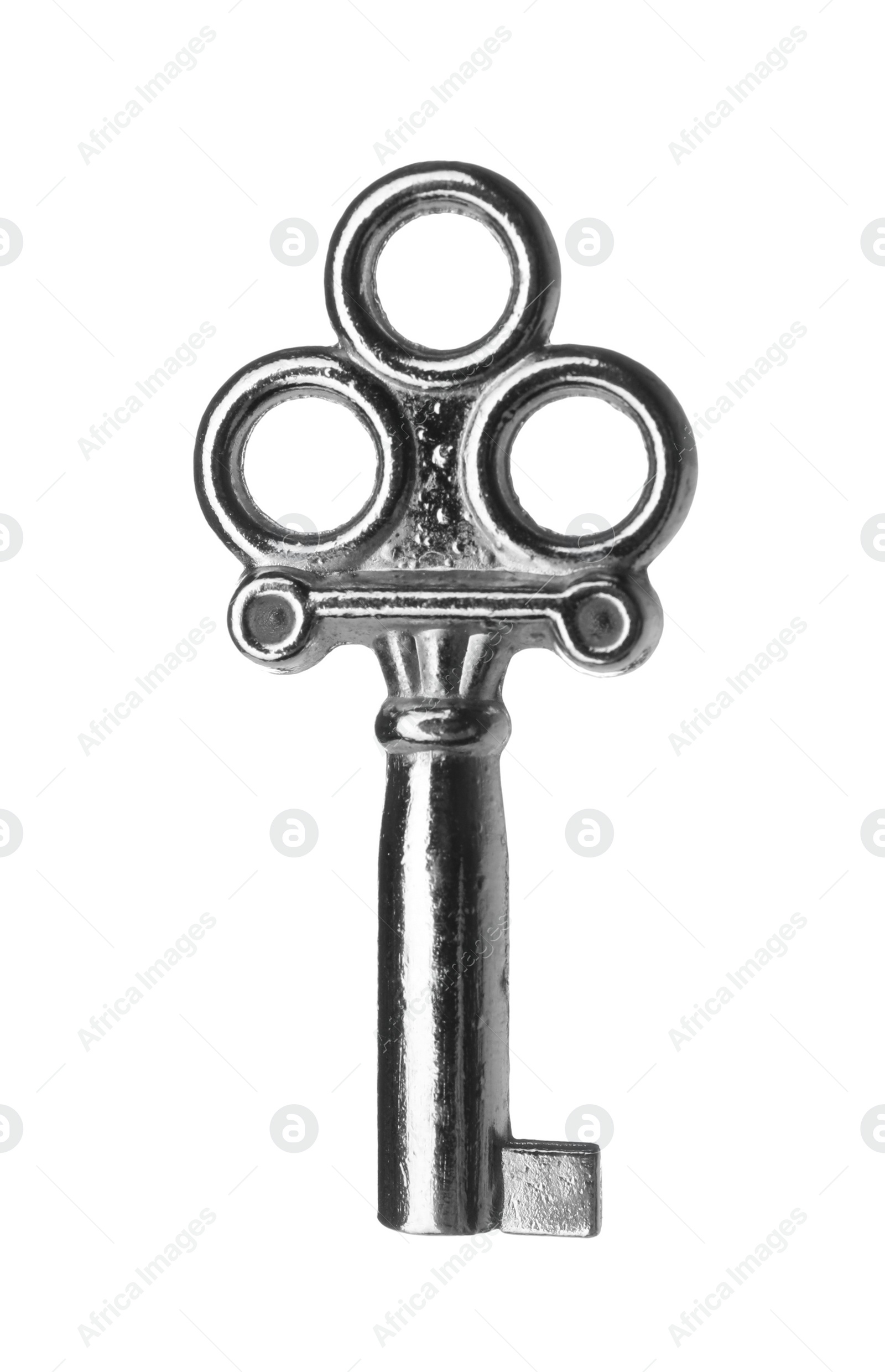 Photo of Steel vintage ornate key on white background