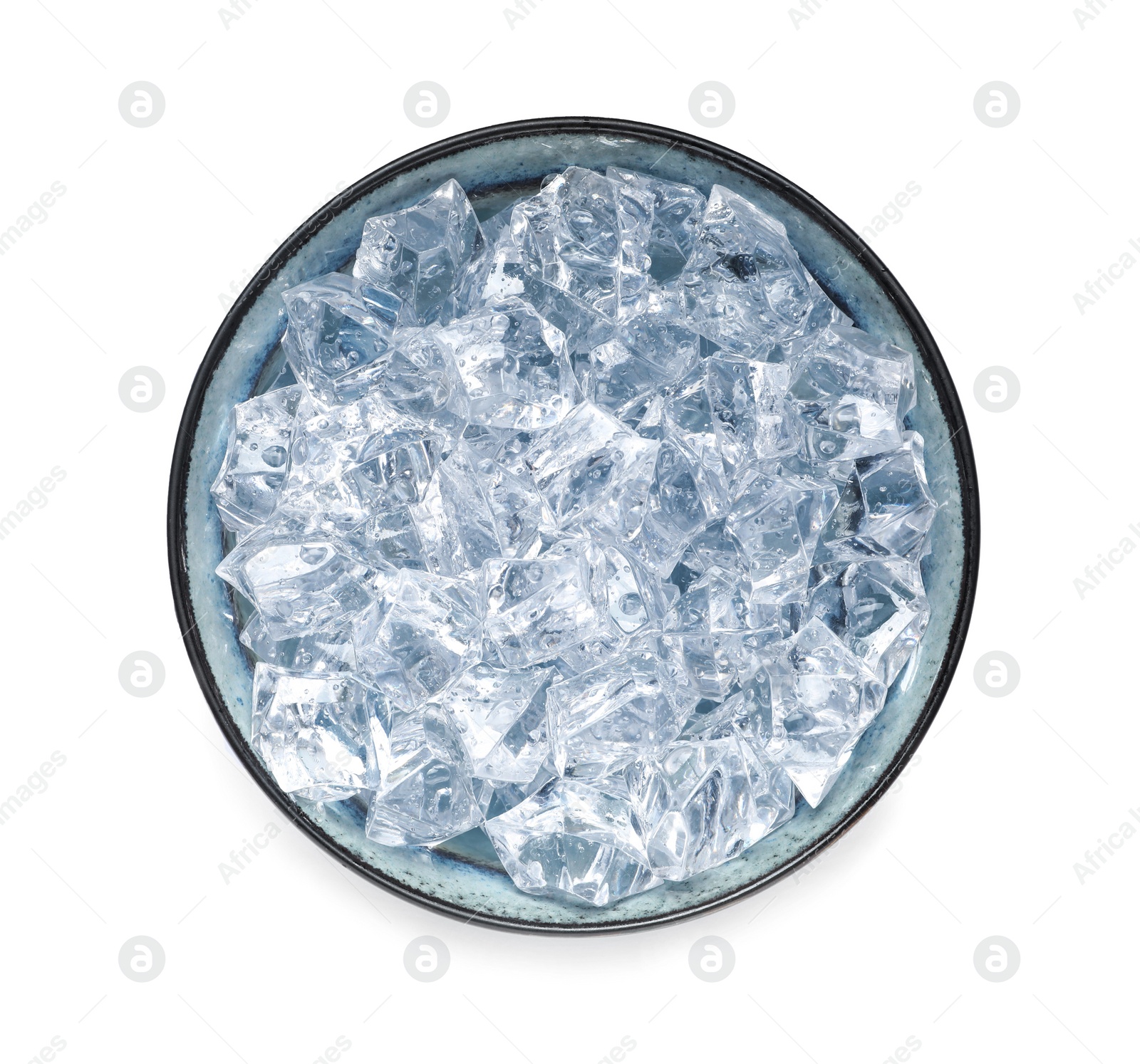 Photo of Crushed ice in bowl on white background, top view