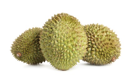 Whole ripe durian fruits on white background