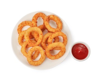 Tasty fried onion rings with ketchup on white background, top view