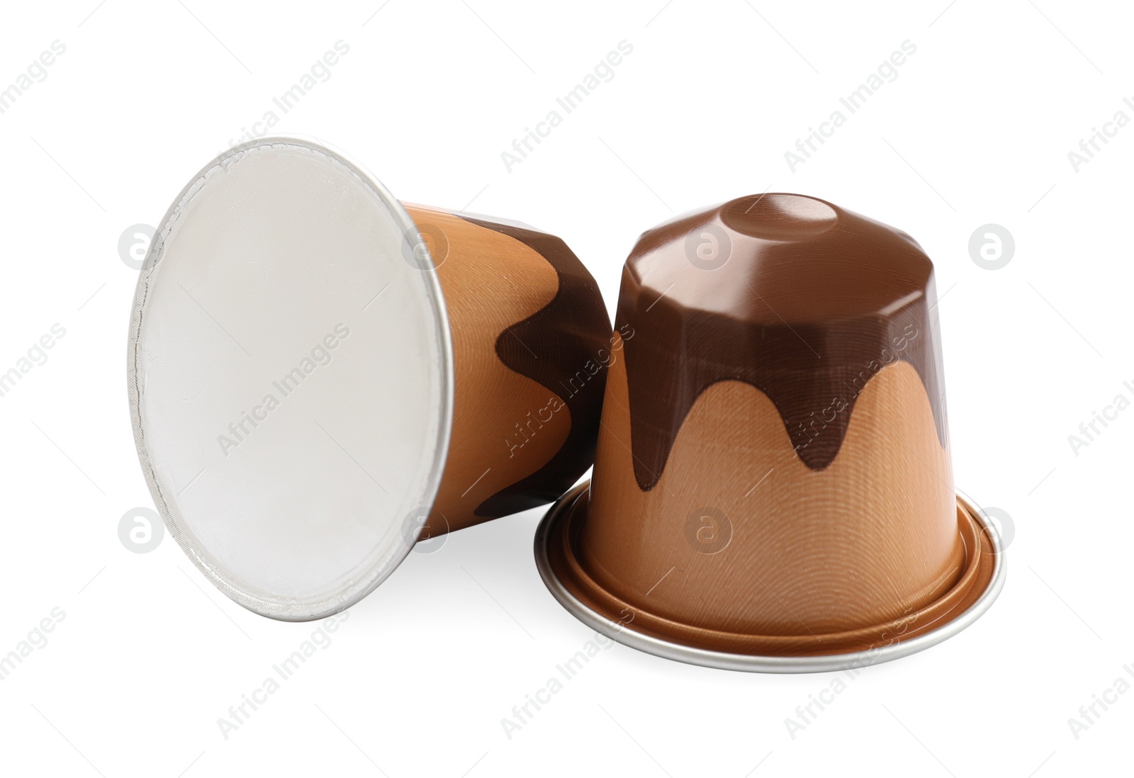 Photo of Two plastic coffee capsules isolated on white