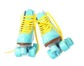 Photo of Pair of bright stylish roller skates on white background