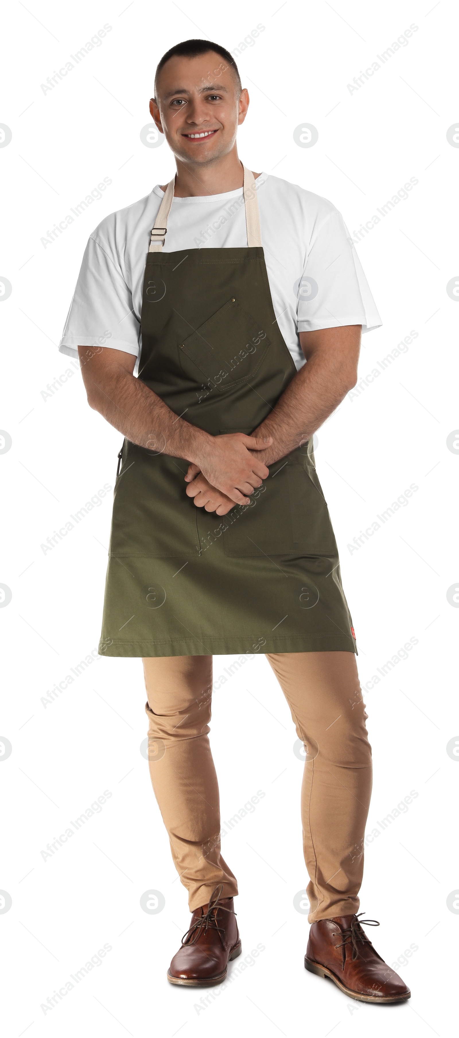 Photo of Full length portrait of happy young waiter in uniform on white background