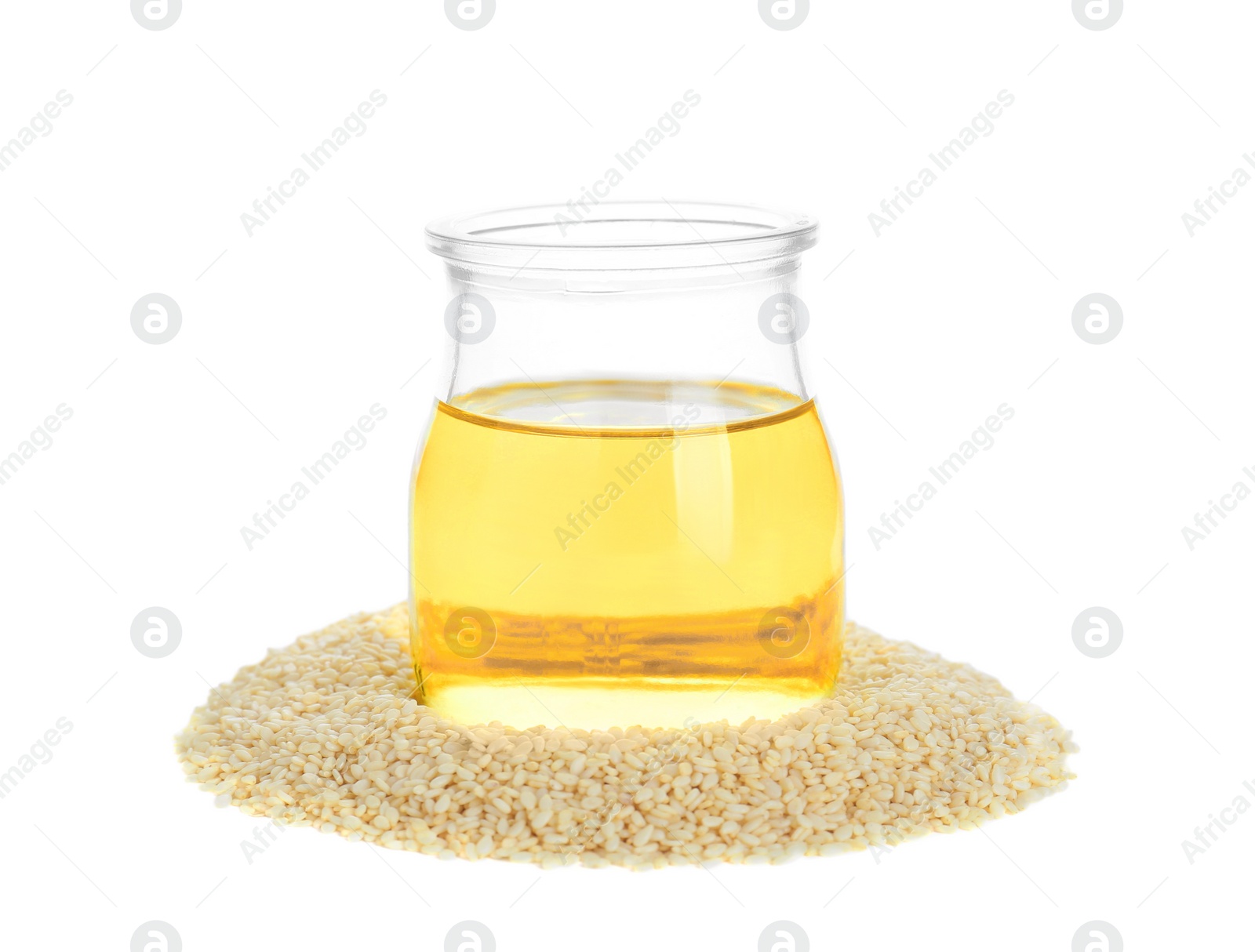 Photo of Glass jar with fresh sesame oil and seeds isolated on white