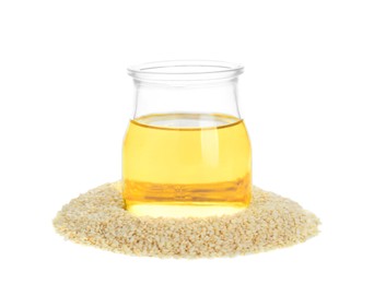 Glass jar with fresh sesame oil and seeds isolated on white