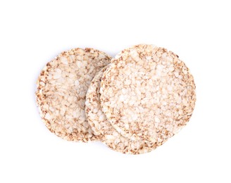 Photo of Crunchy buckwheat cakes on white background , top view