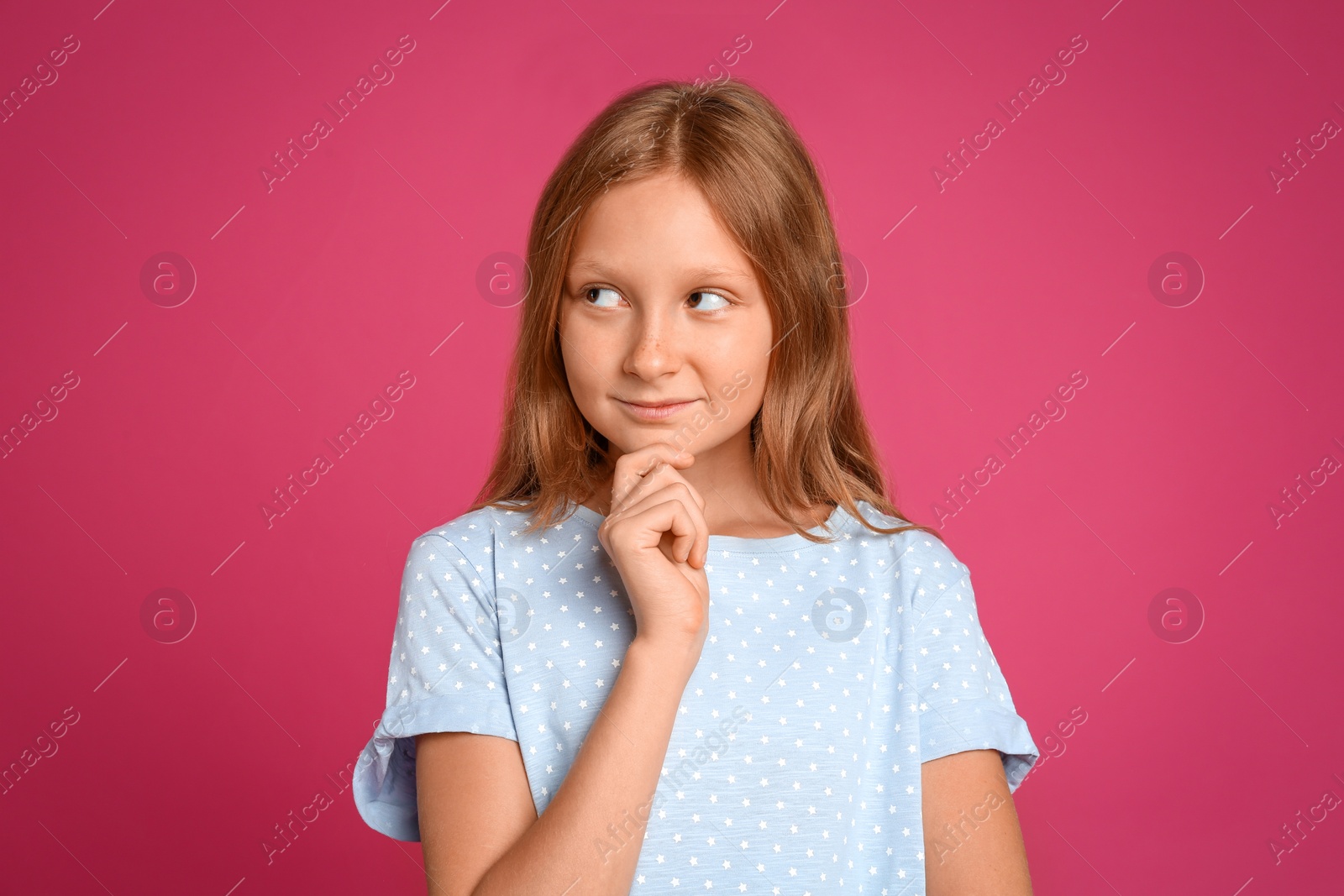 Photo of Portrait of preteen girl on pink background