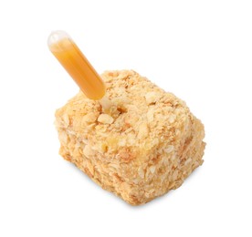 Photo of Piece of Napoleon cake with jam pipette on white background