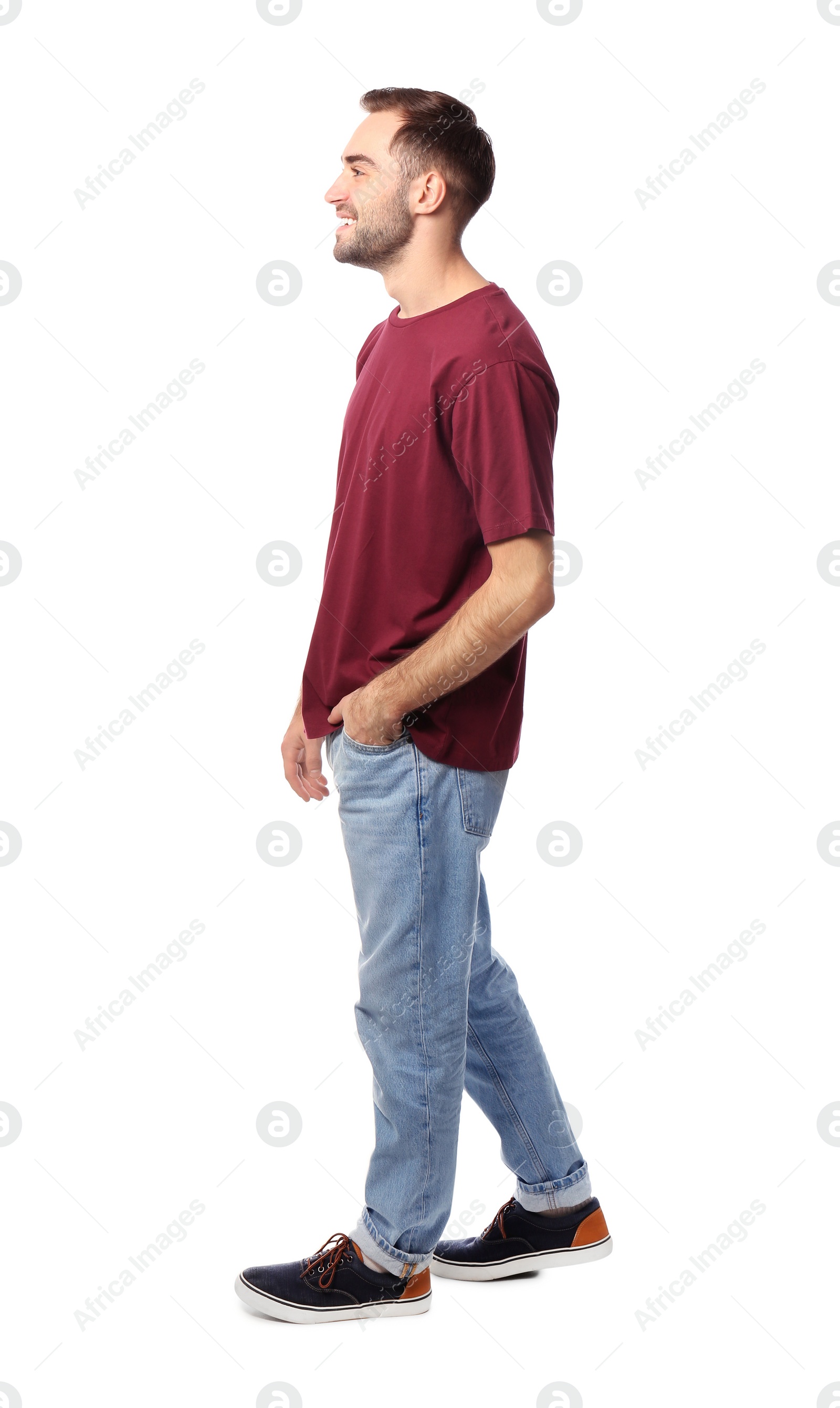 Photo of Full length portrait of handsome man posing on white background