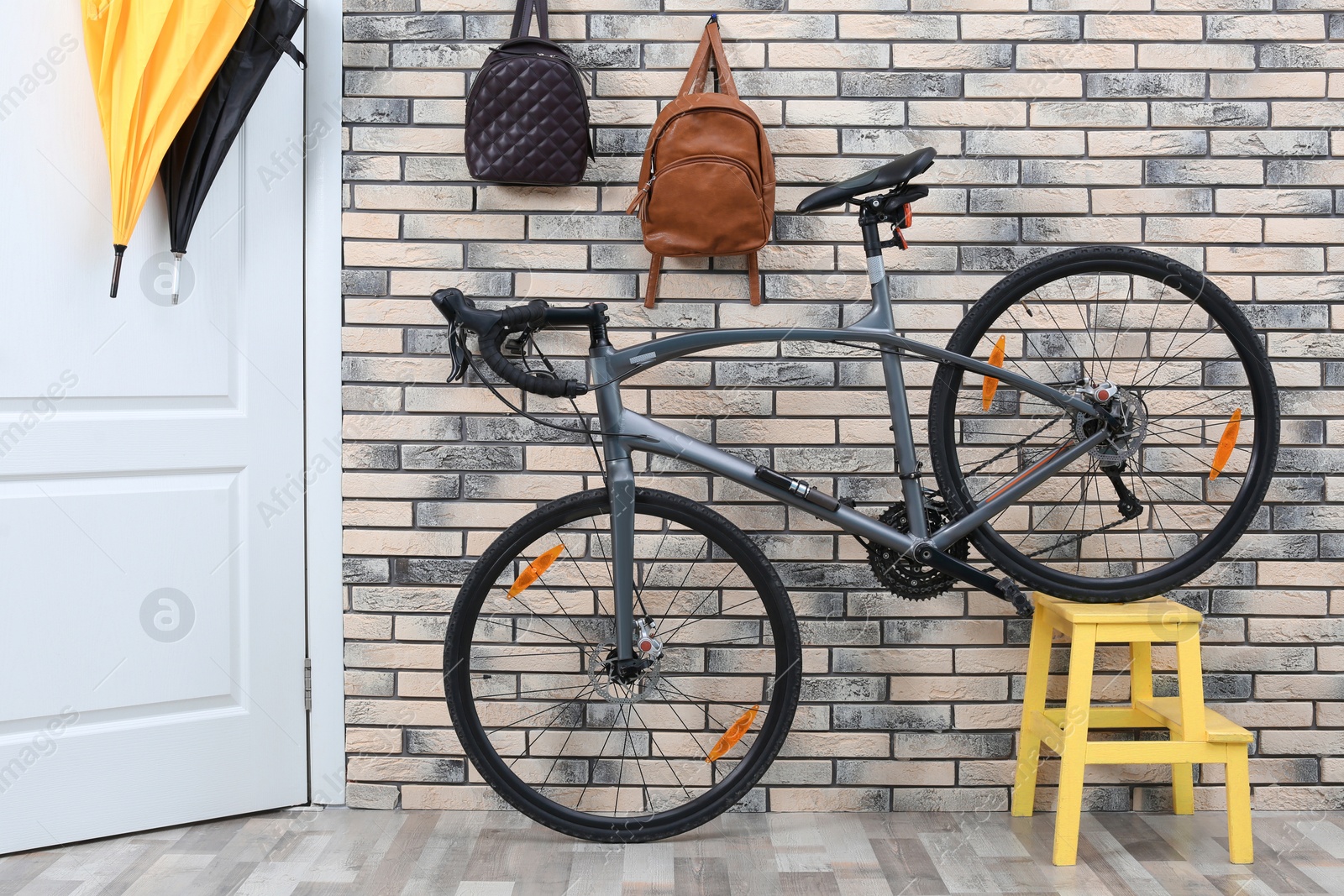 Photo of Modern bicycle in stylish hallway interior