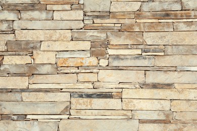 Photo of Texture of light stone wall as background