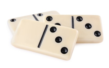 Photo of Classic light domino tiles on white background