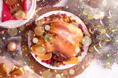 Image of Delicious roasted turkey served for Christmas dinner on table, flat lay