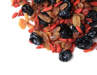 Photo of Pile of different tasty dried fruits on white background, top view