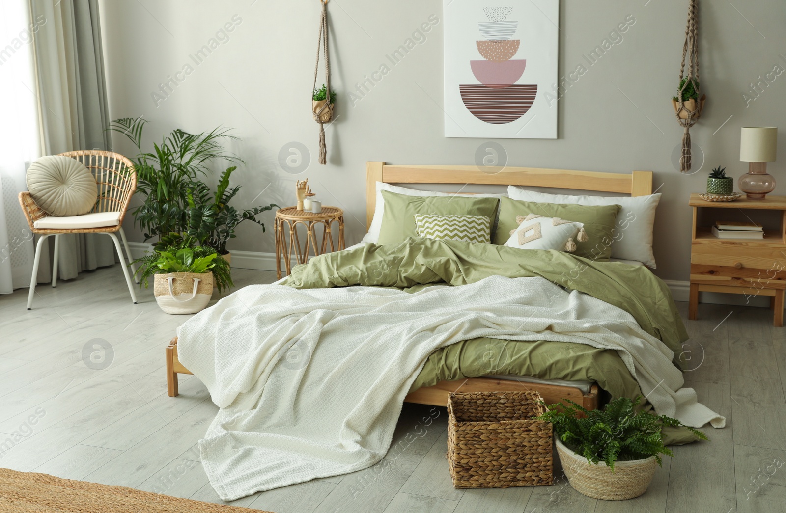 Photo of Stylish room interior with comfortable wooden bed