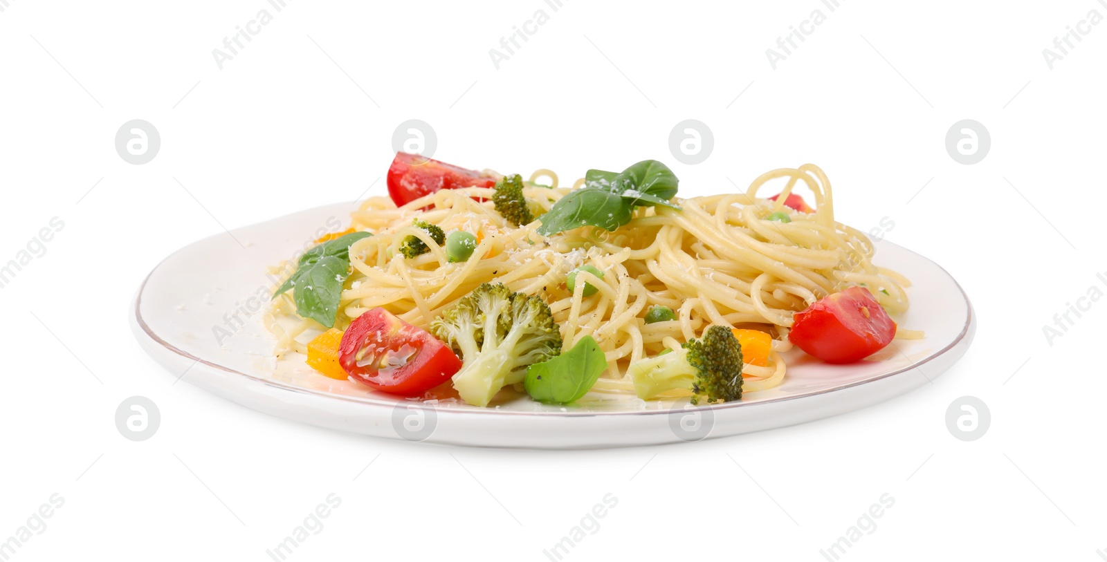 Photo of Plate of delicious pasta primavera with tomatoes, basil and broccoli isolated on white