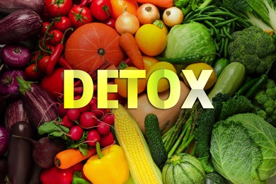 Word Detox and many fresh vegetables on background, top view