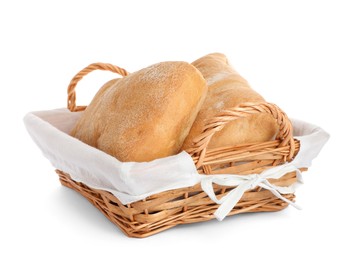 Photo of Crispy ciabattas in wicker basket isolated on white. Fresh bread