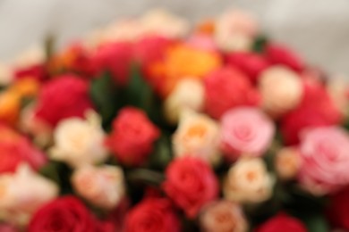 Photo of Bouquet of beautiful colorful roses, blurred view