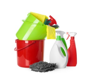 Photo of Plastic buckets and different cleaning supplies on white background