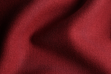 Photo of Texture of beautiful red fabric as background, closeup