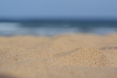 Beautiful sandy beach near sea, closeup view