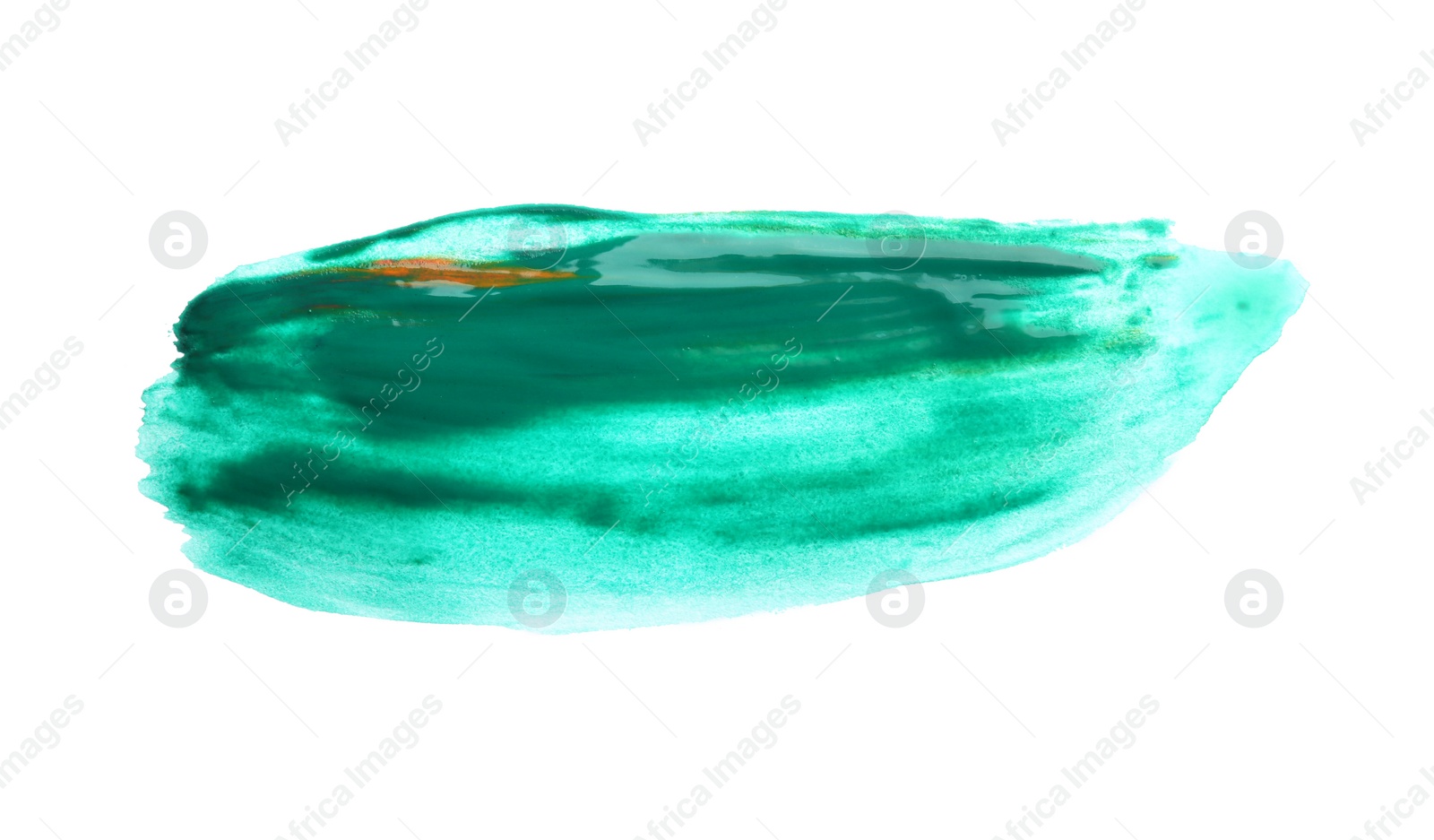 Photo of Abstract brushstroke of green paint isolated on white