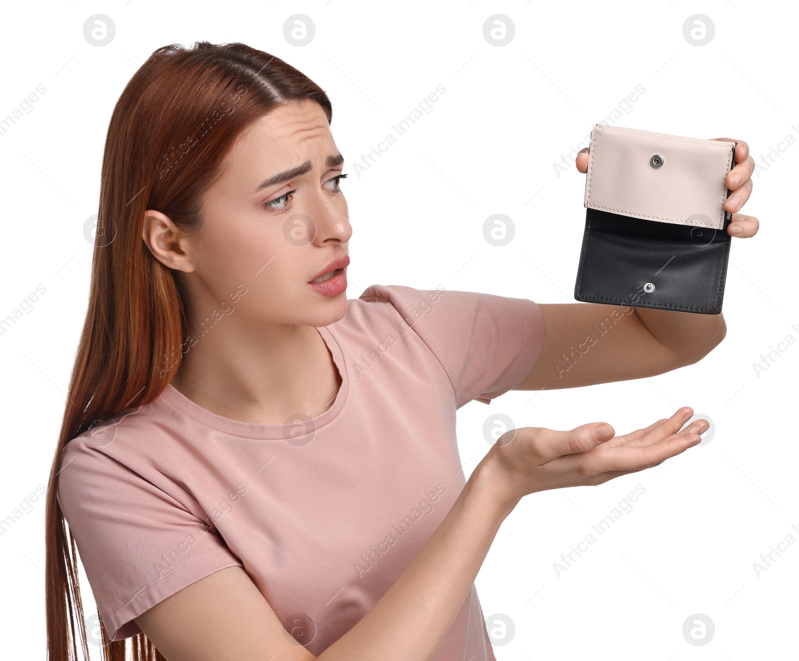 Photo of Upset woman with empty wallet on white background