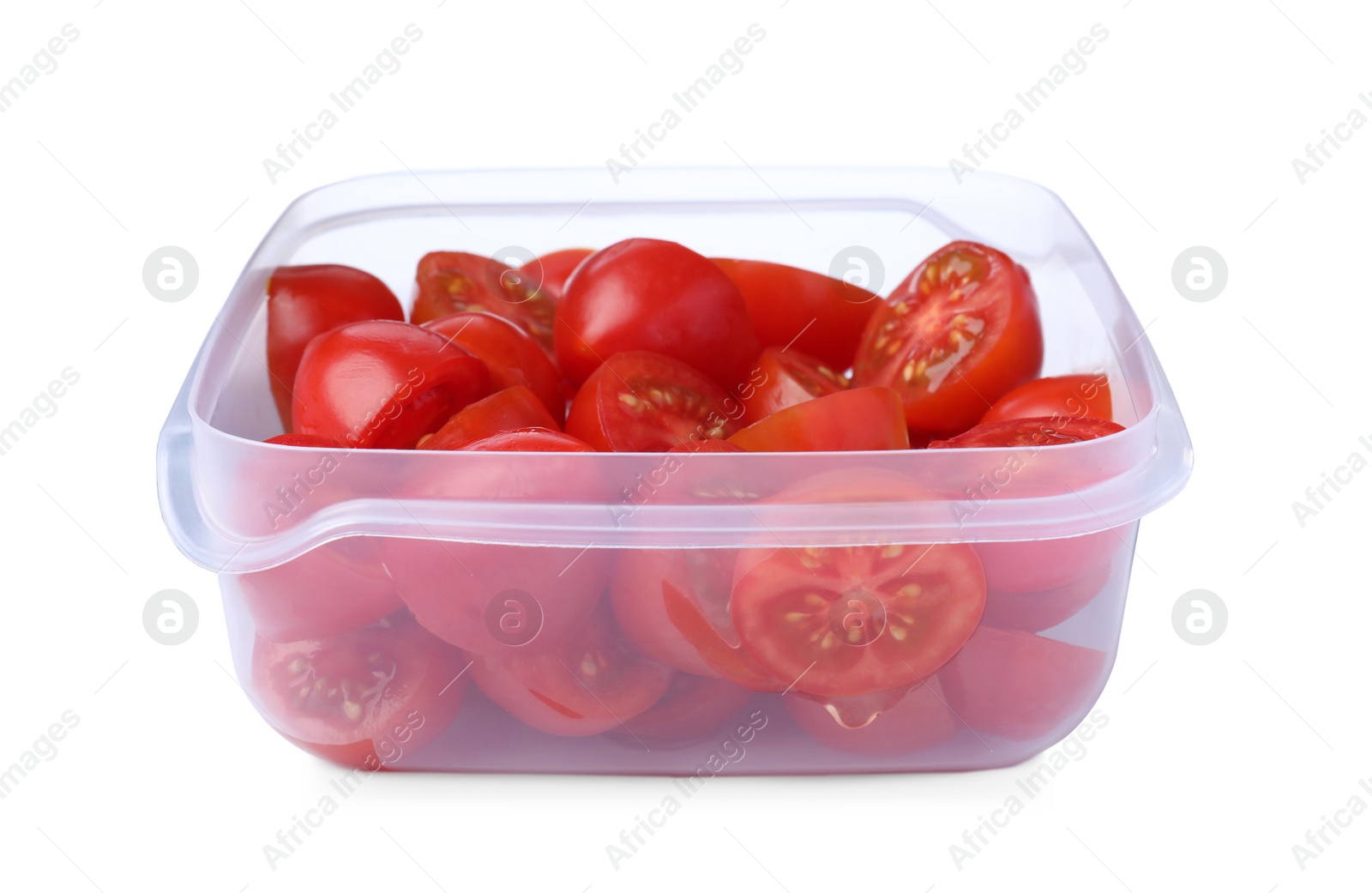 Photo of Fresh cut cherry tomatoes in plastic container isolated on white