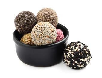 Photo of Different delicious vegan candy balls on white background