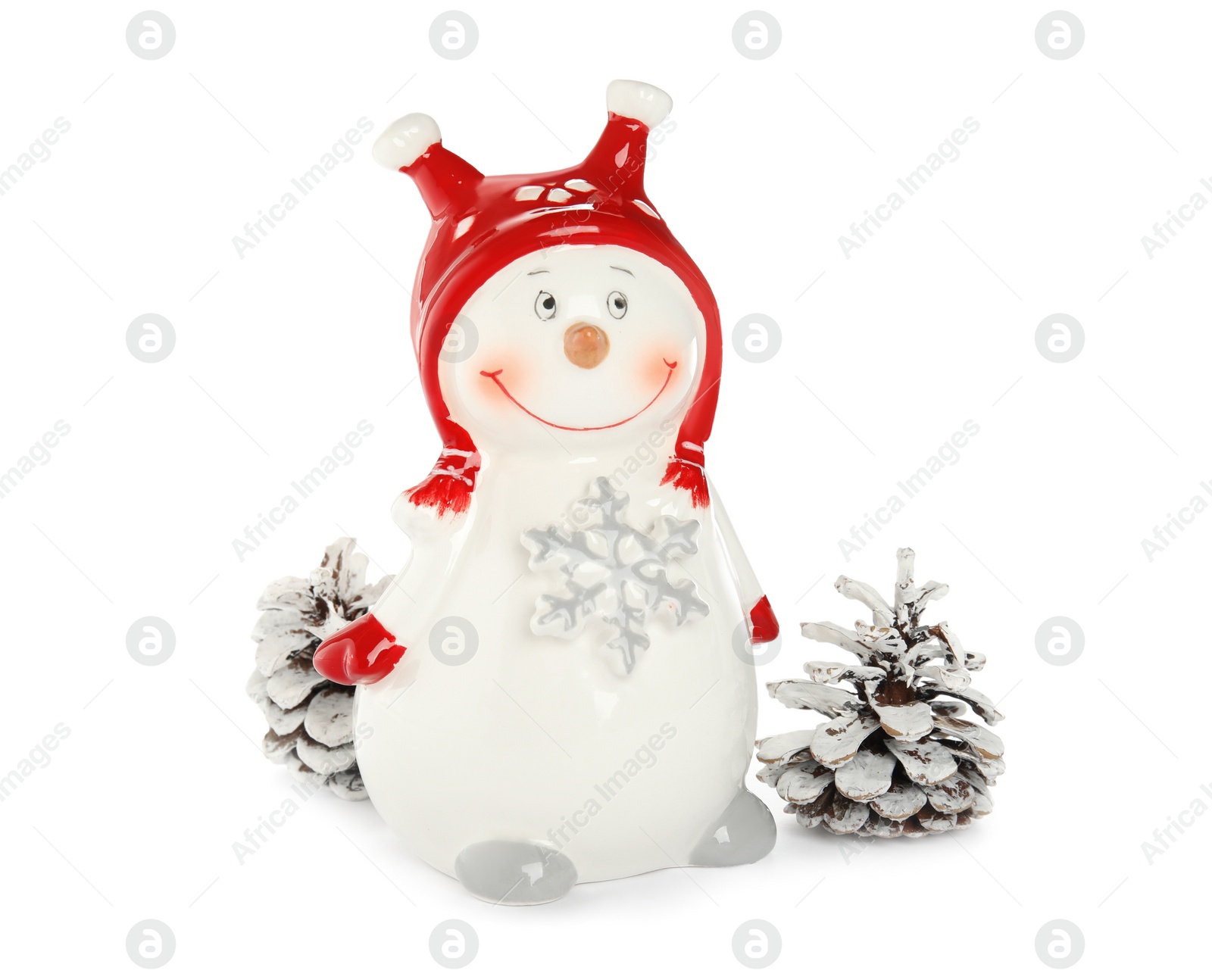 Photo of Decorative snowmen near cones on white background