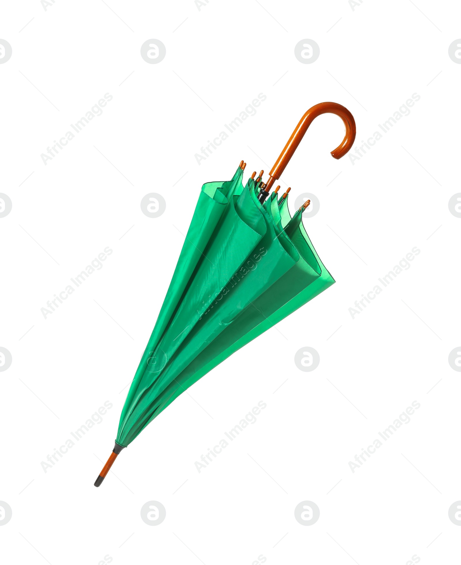 Photo of Modern closed green umbrella isolated on white