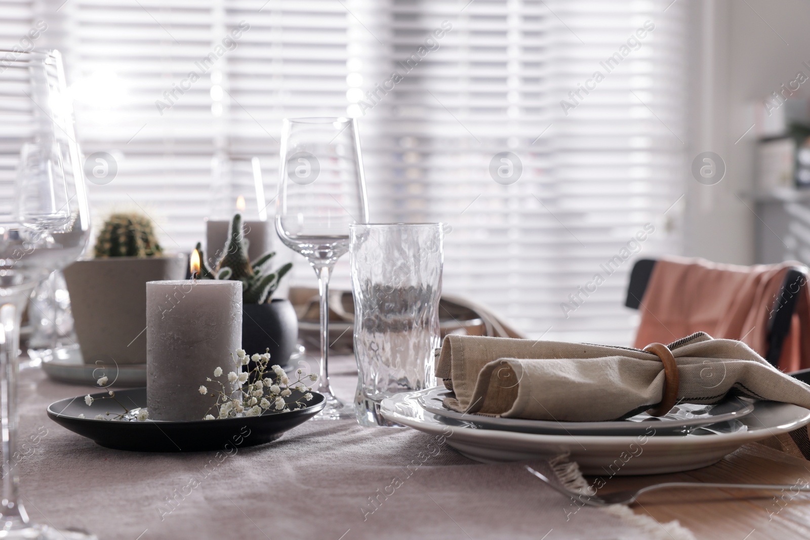 Photo of Festive table setting with beautiful tableware and decor indoors