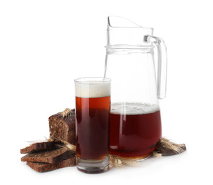 Delicious kvass, bread and spikes on white background