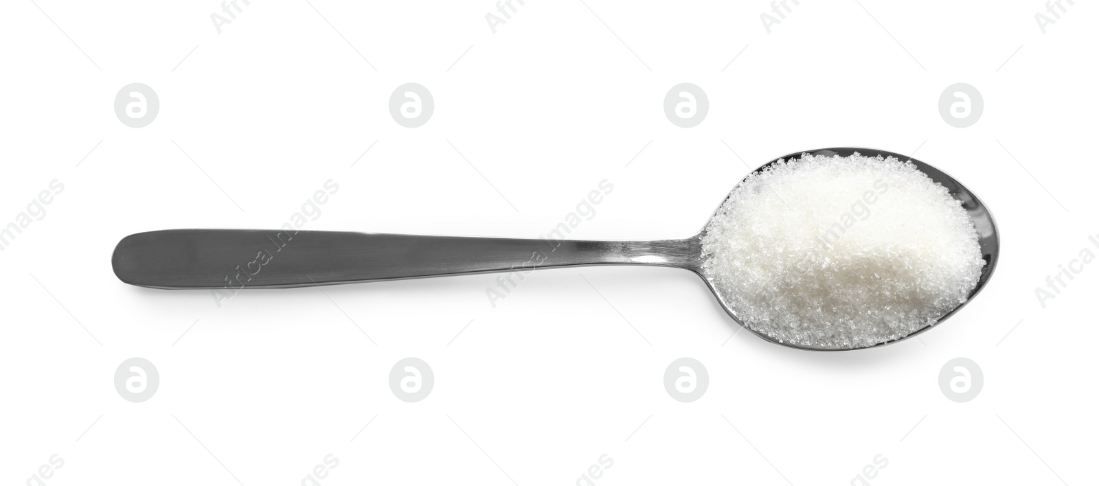 Photo of Granulated sugar in spoon isolated on white, top view