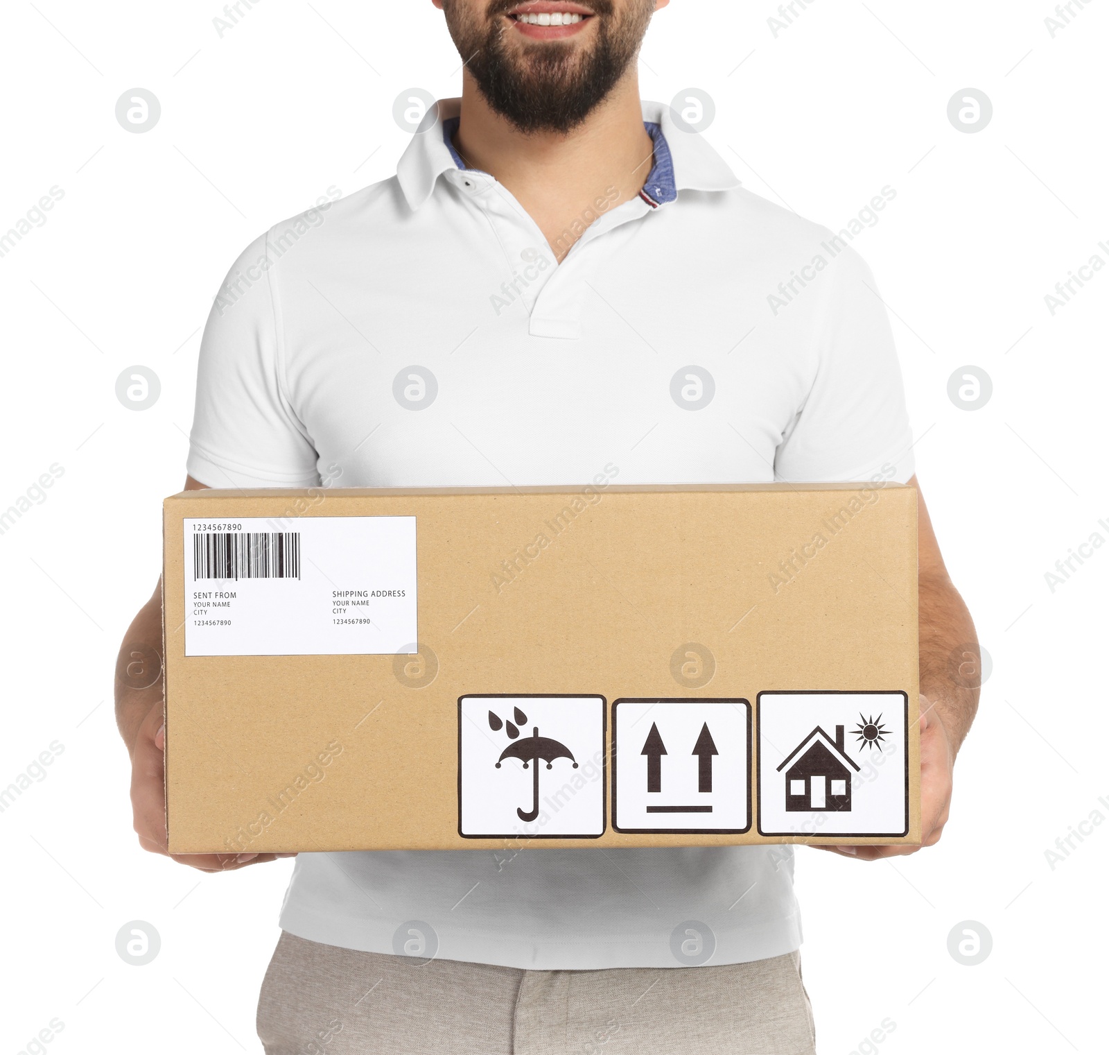 Photo of Courier holding cardboard box on white background, closeup