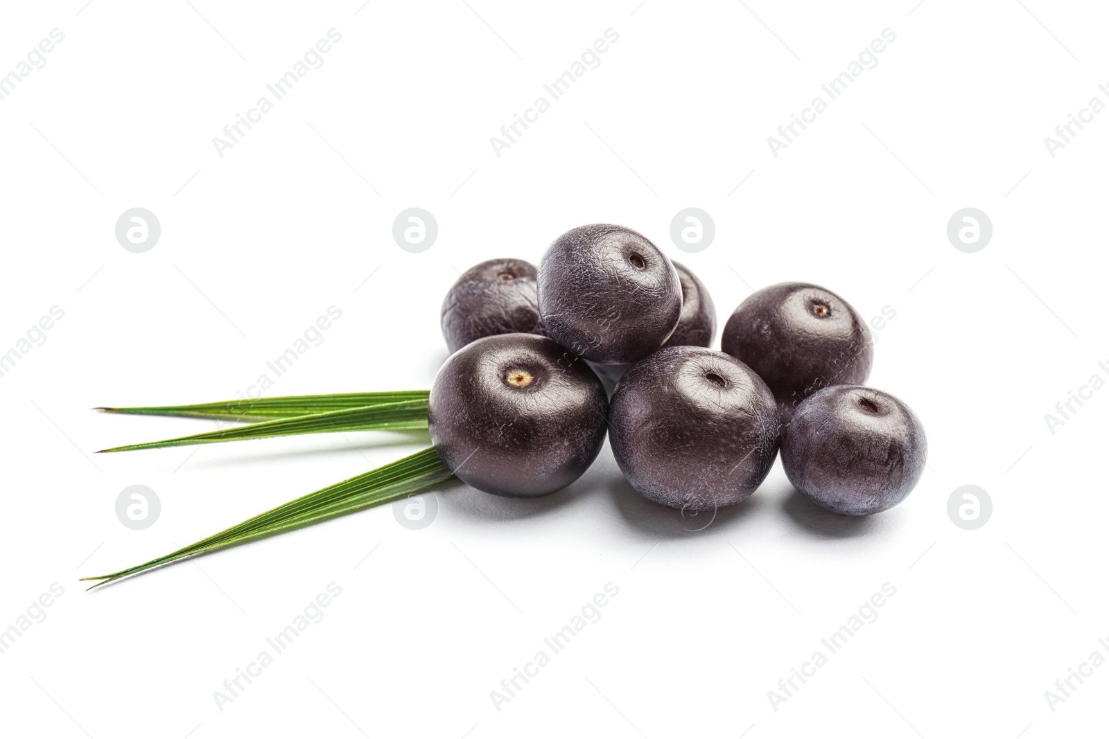 Photo of Fresh acai berries with leaves on white background