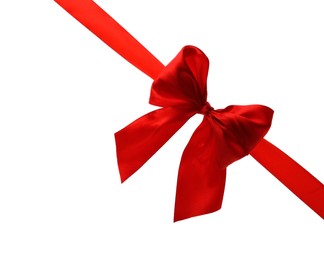 Photo of Red ribbon with bow on white background. Festive decoration